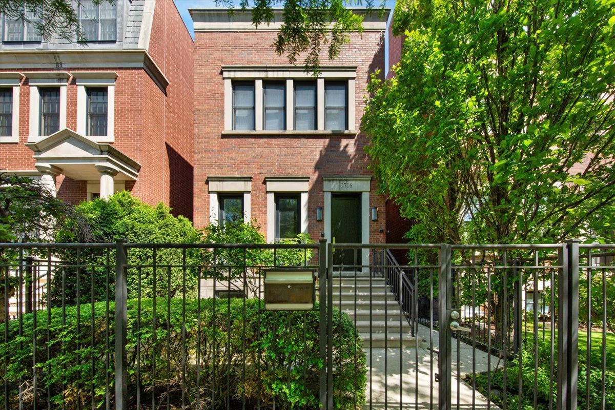 Front exterior of 1716 W Wolfram St, Chicago, a brick single family home in Lakeview